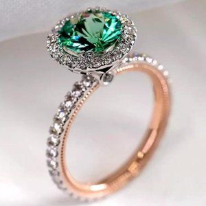 Gold band with crystals and faux center green stone ring. Size 8